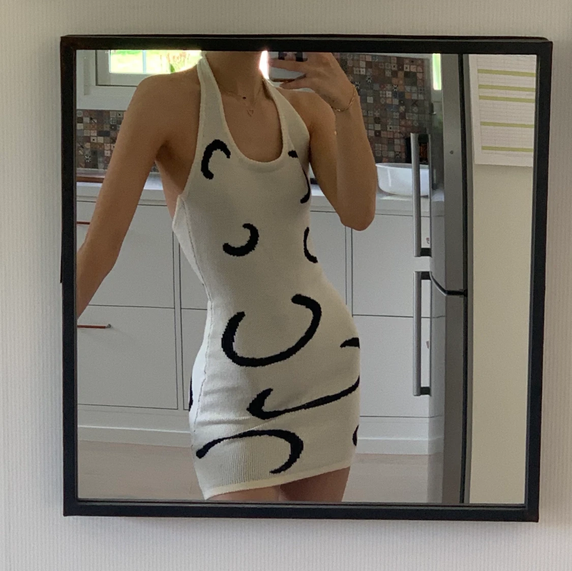 Stickad halterneck klänning 