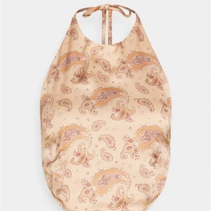 Halterneck linne  - Ett linne från missguided när man själv får knyta bak på ryggen och i nacken, tog storlek S men är mer som en XS, säljer pga jag aldrig får användning av den samt att den är för liten för mig 