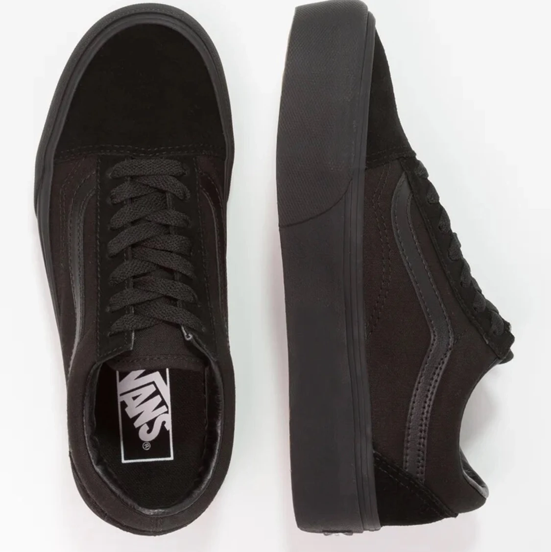 Svarta Vans med platå