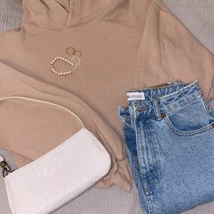 A beige hoodie size S from Zara 