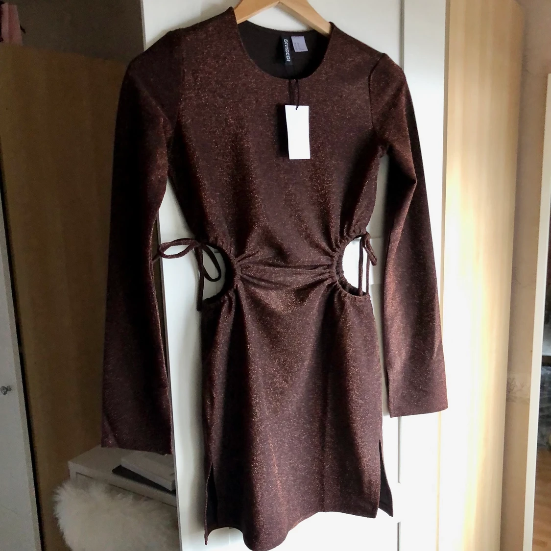 Ny brun glittrig klänning från Hm XS