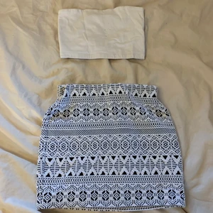 Gulligt set  - En kjol storlek 134/140 passar även xxs från Cubus jättefint skick,    en bandeau top vit från Gina storlek xs tyvärr några prickar på den men annars i fint skick. Köparen står för frakten (66kr)☺️