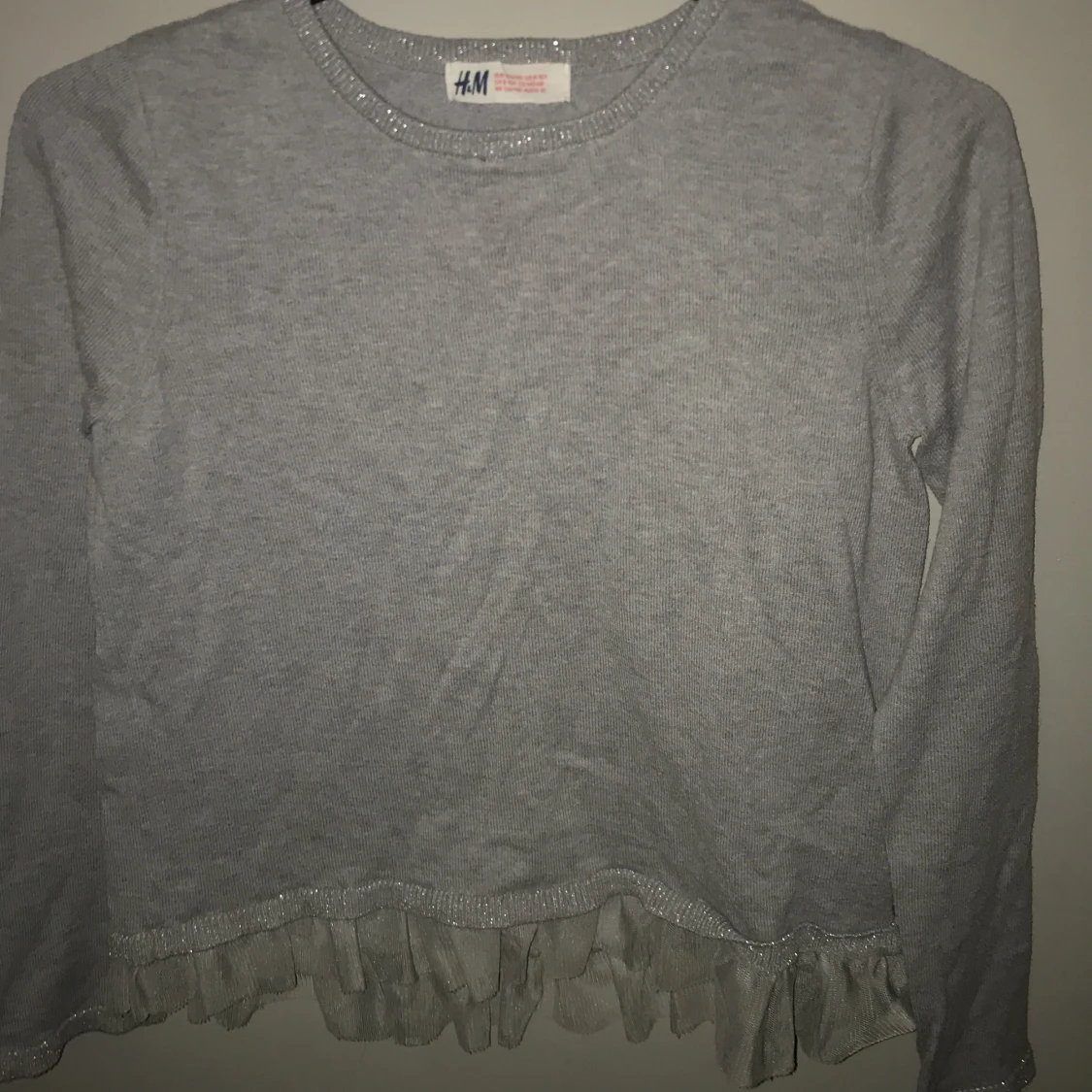 Grå långärmad tröja