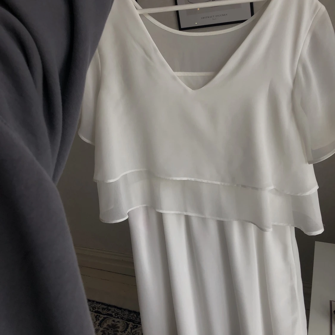 Vit STUDENTKLÄNNING från Bubbleroom