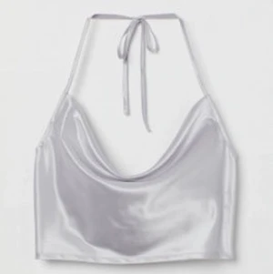 Silver linne - Säljer detta silvriga linne som jag endast har använt 1 gör gång!  Köparen står för frakten!