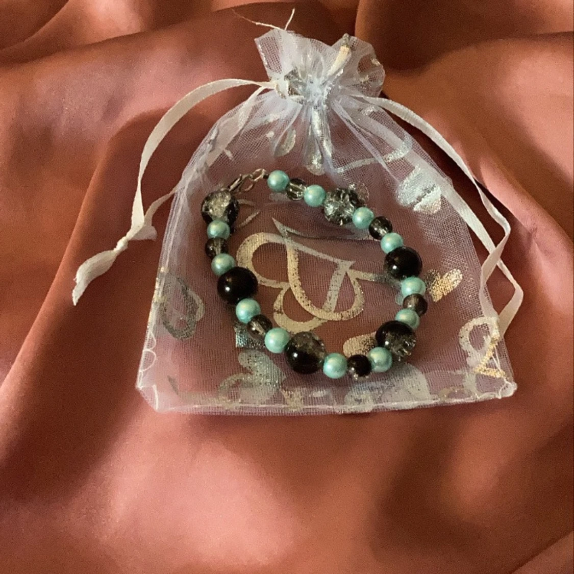 Turkos/svart armband - 26