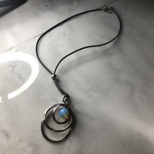 Tacky, Vintage Necklace  - This was bought from Lyckliga Jag a long time ago for quite surprisingly a pretty high price. It has a metal charm, is lighter than it looks and apparently a form of art. Hopefully it catches an eye! 