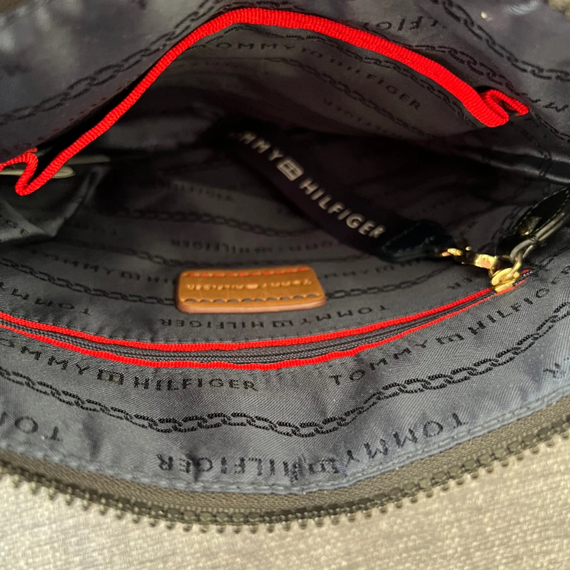 Tommy Hilfigher  - 91