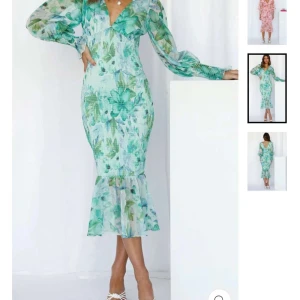 Klänning - En superfin grönmönstrad klänning. Den är helt ny och aldrig använd, endast provad. Storlek M.