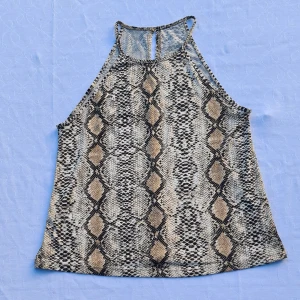 Orm mönster topp - Fin topp men orm mönster i bra skick 