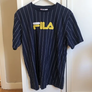 Fila T-shirt - Snygg T-shirt i väldigt fint skick!