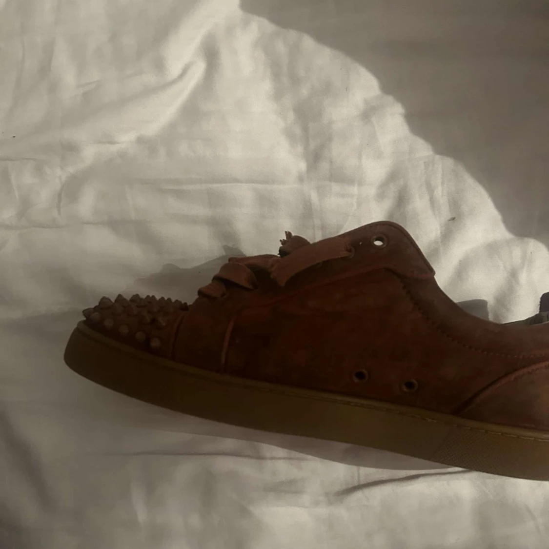 Christian Louboutin  - 90