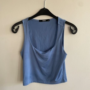 Urringat linne  - Urringat linne i blå 