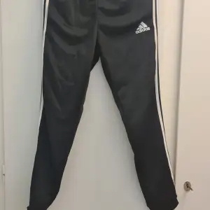Adidas sweatpants, used once. Polyester blend. 