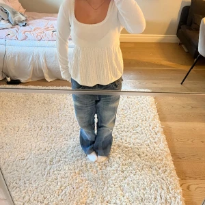 Långärmad blus, Hollister  - Urringad stickad blus köpt på Hollister i Paris! 