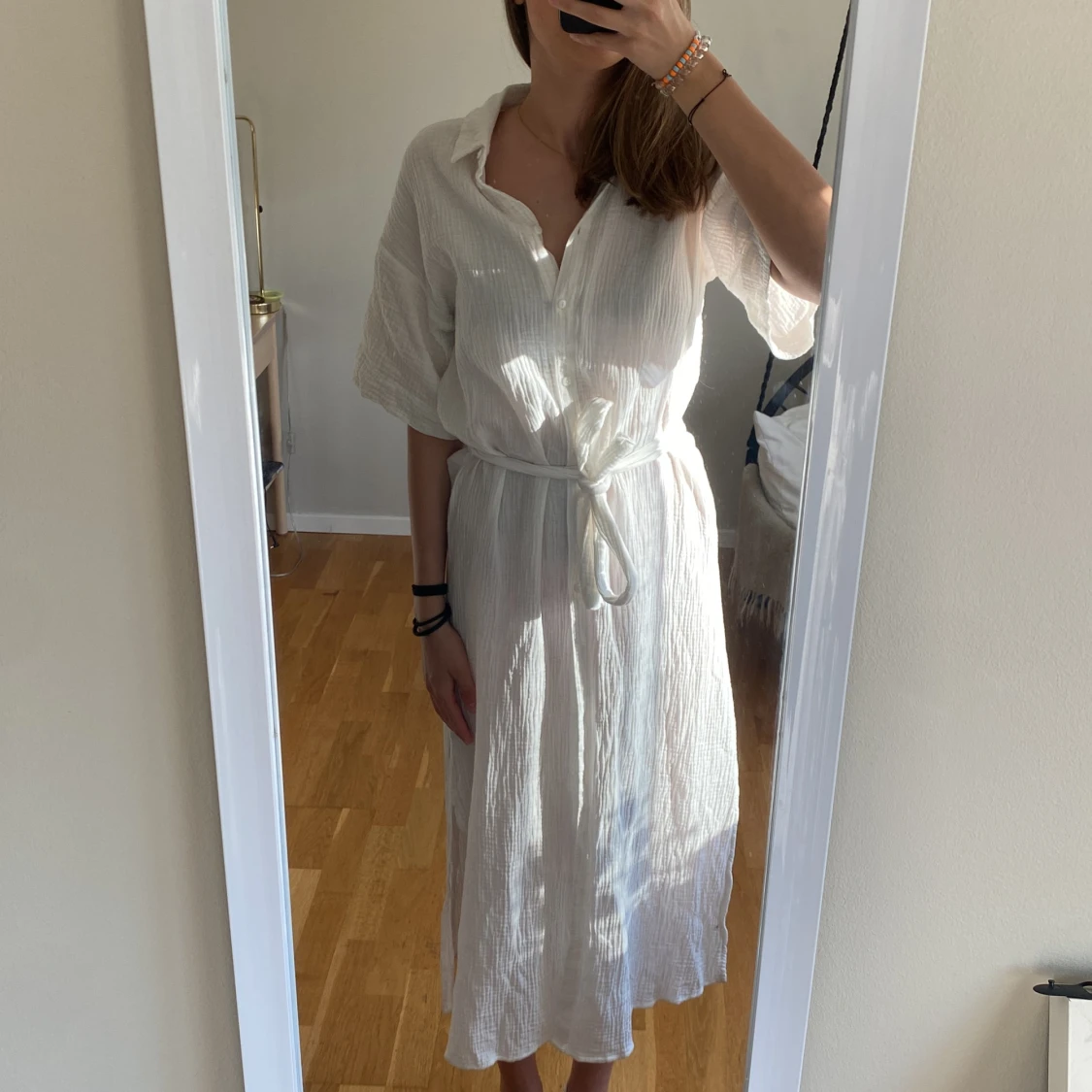 En vit lång klänning - 90