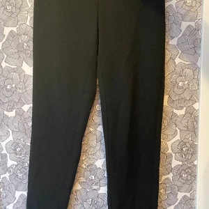 Svarta kostymbyxor - Svarta kostymbyxor