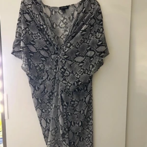 Sarrong klänning - Fint skick.