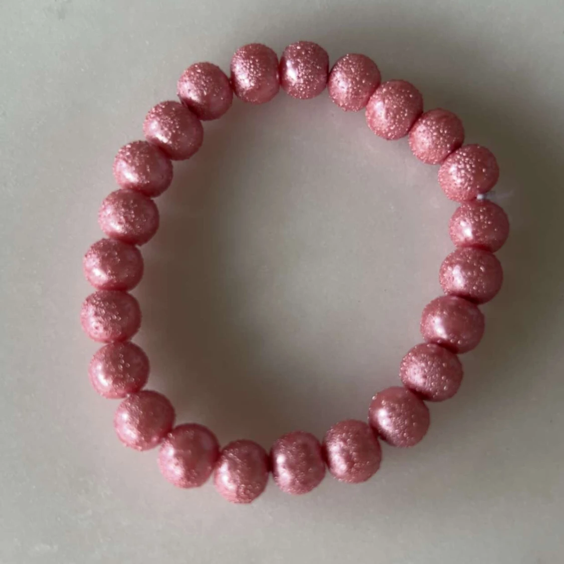Rosa glittrig pärlarmband🩷