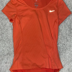 Orange träningstopp  - Luftig T-shirt 