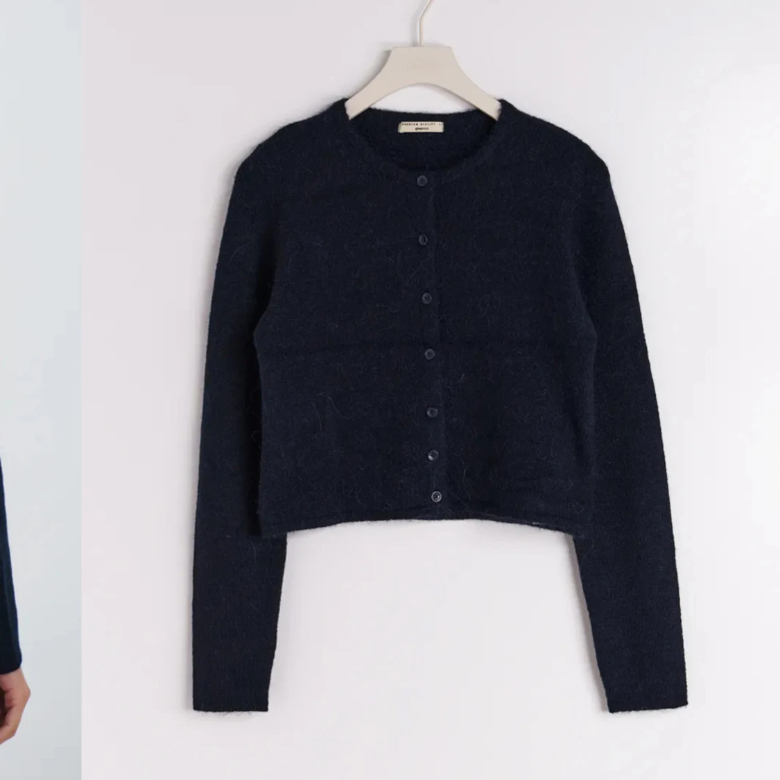 Marinblå stickad kofta 