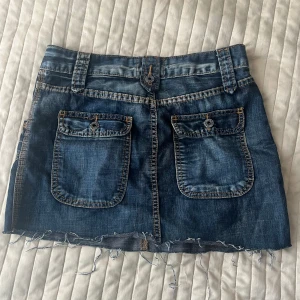 Jeanskjol - Jeanskjol med snygga fickor storlek 38