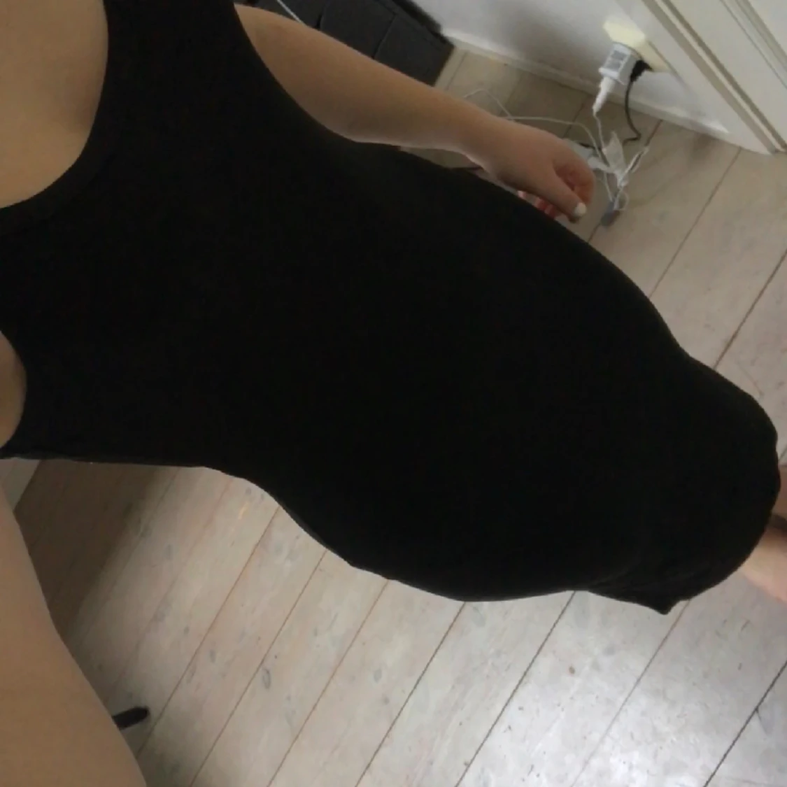 Svart, tajt klänning