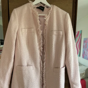 Kappa - Rosa kappa i fint material, skönt material och jätte fin inför sommaren 