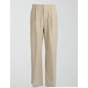 Linen trousers beige - Beige linnebyxor i nyttskick i regular. 