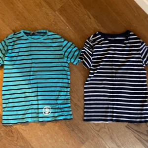Två t-shirts i storlek 134/140 - I mycket fint skick 