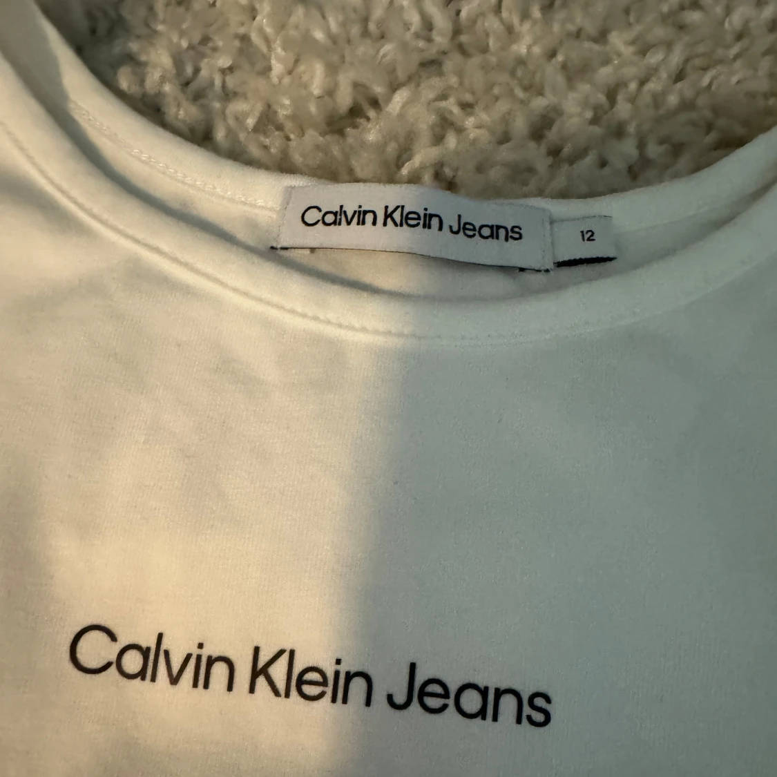 Ett mycket fint vitt Calvin Klein linne - 91