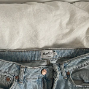 Blåa jeans - Säljer mina blå jeans från nakd då dem tyvärr är för små! 