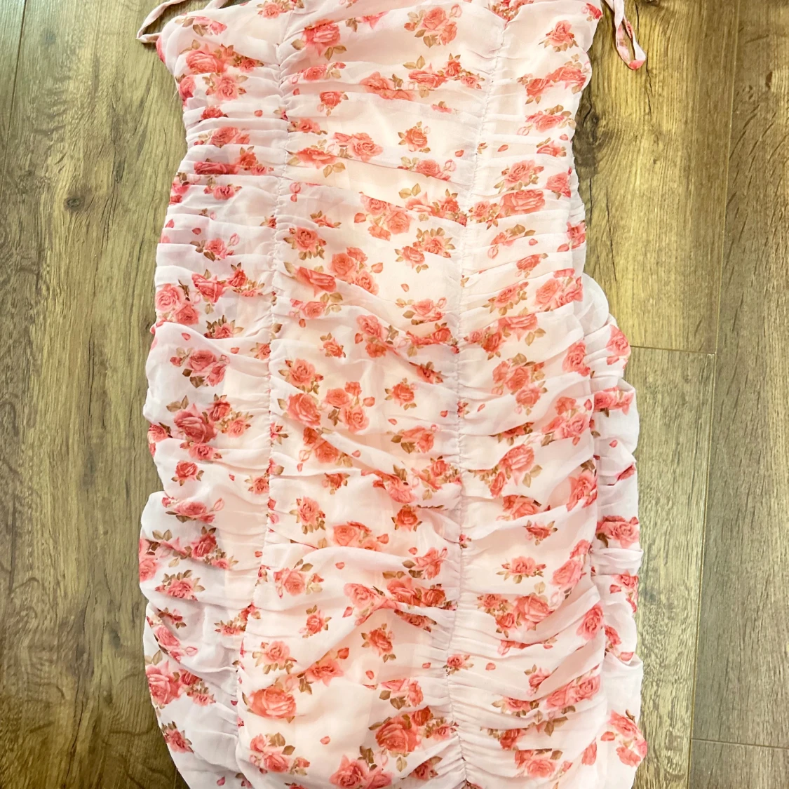 Rosa blommig klänning