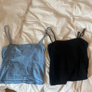 2pack linnen - Ett blått och ett svart linne från h&m som inte kommer till användning längre. Säljer 1 linne för 20 och två för 50kr