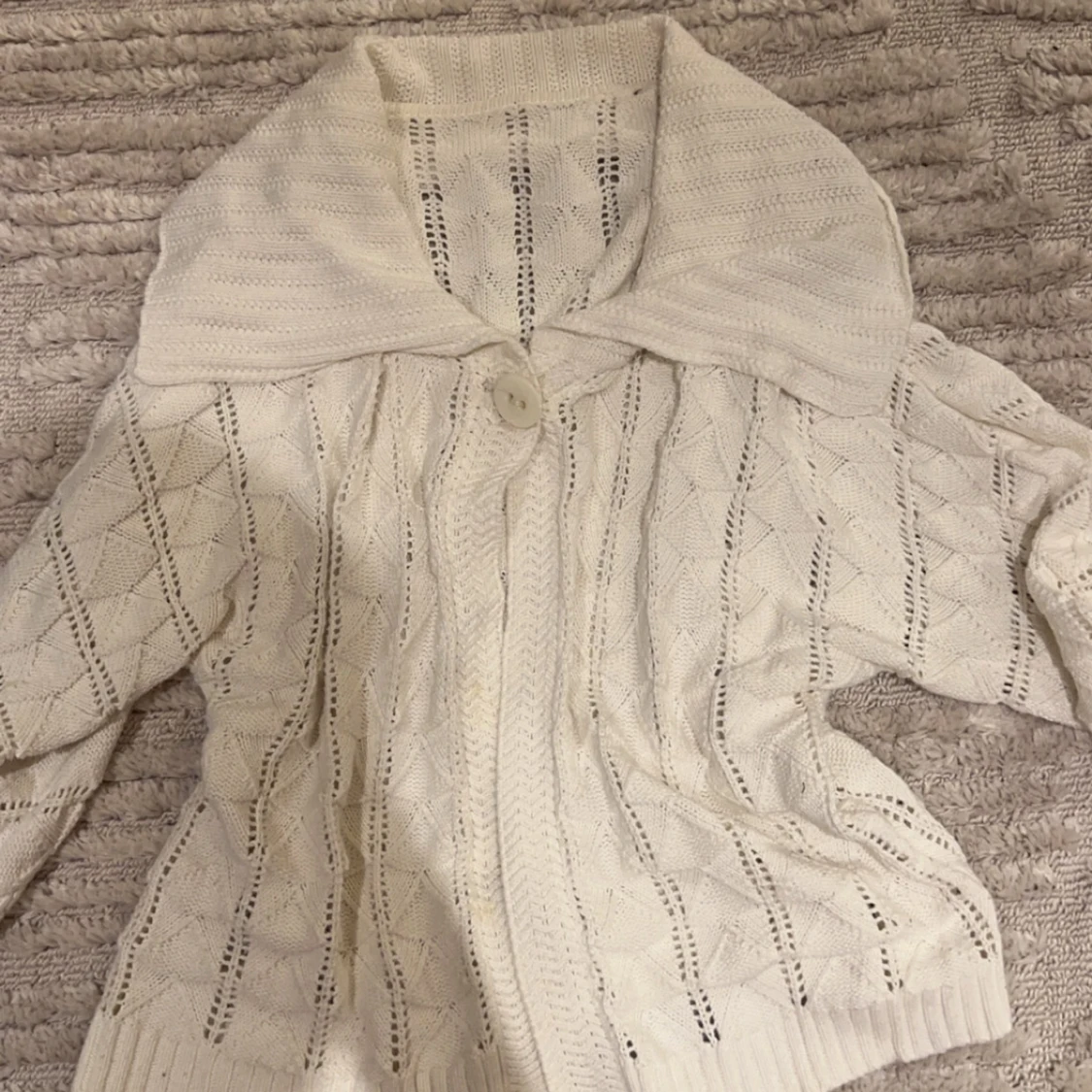 kofta med tre kvarts armar