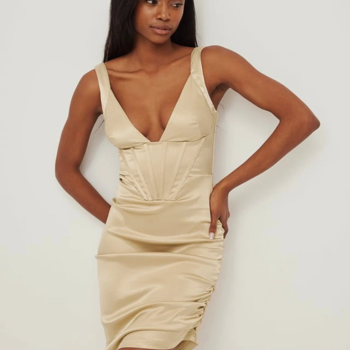 Klänning i guld/sand färg