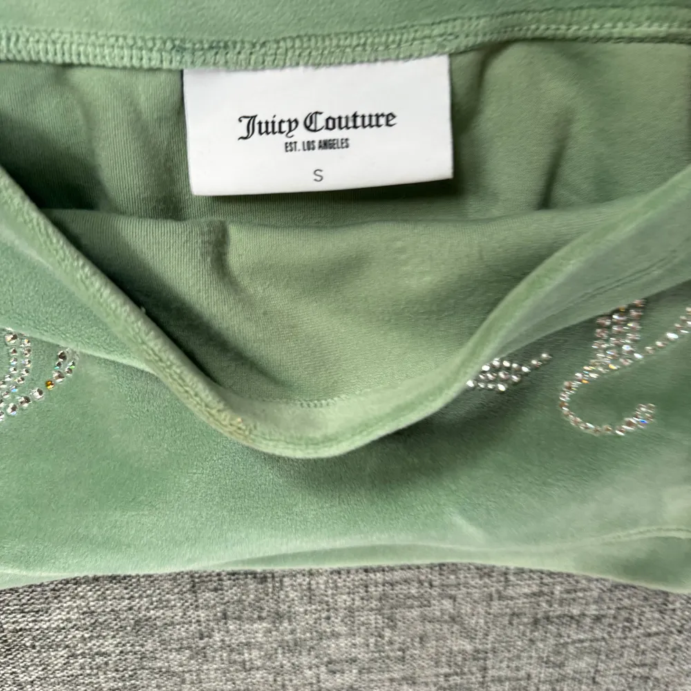 Fint skick grönt juicy couture linne i storlek s. Toppar.