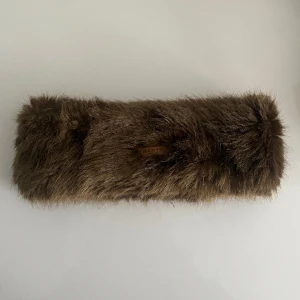 Pälspannband  - Pälspannband från bart’s. Köpt begagnad men aldrig använd. 