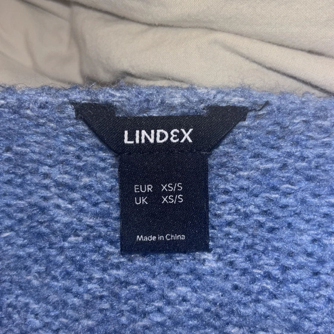 Blå stickad kofta från Lindex - 1