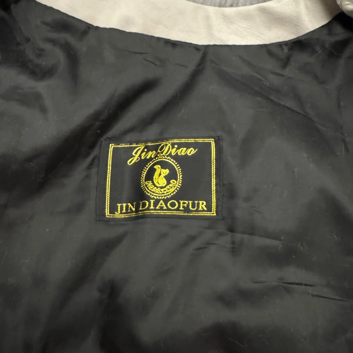 Grå pälsjacka från JinDiaoFur - 2