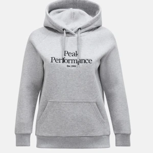 Grå hoodie från Peak Performance - Säljer en fin grå hoodie från peak performance, använd några gånger men inga skador och är i ett bra skick. 