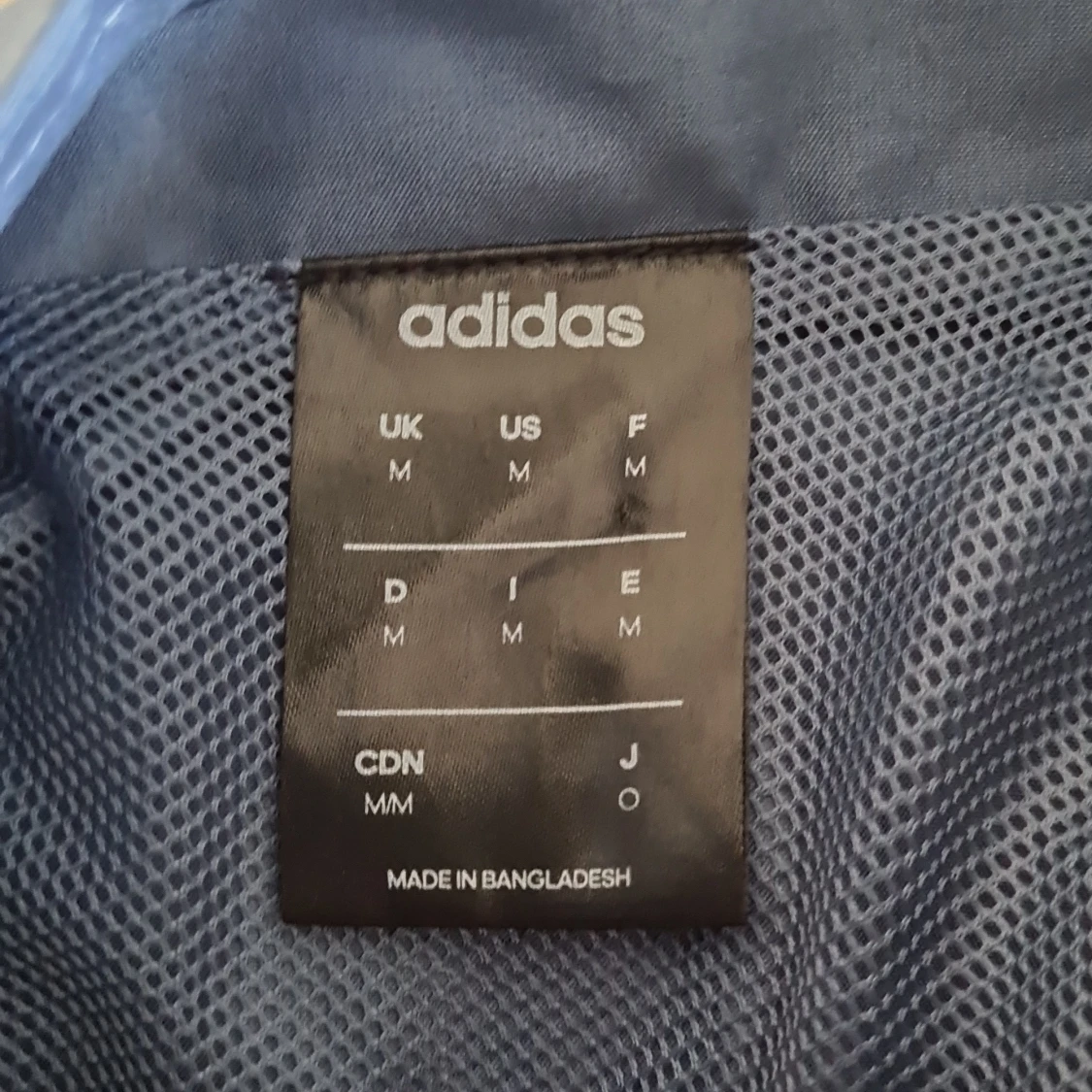 Blå vintage Adidas vindjacka  - 2