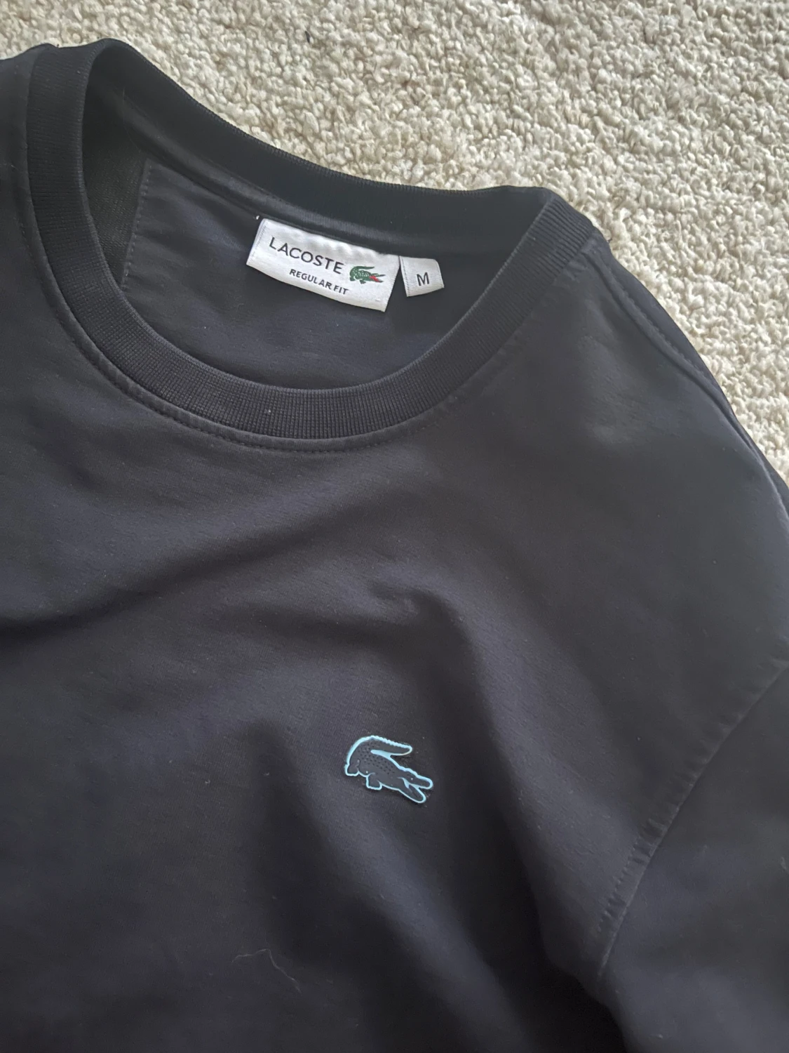 Svart sweatshirt från Lacoste - 1