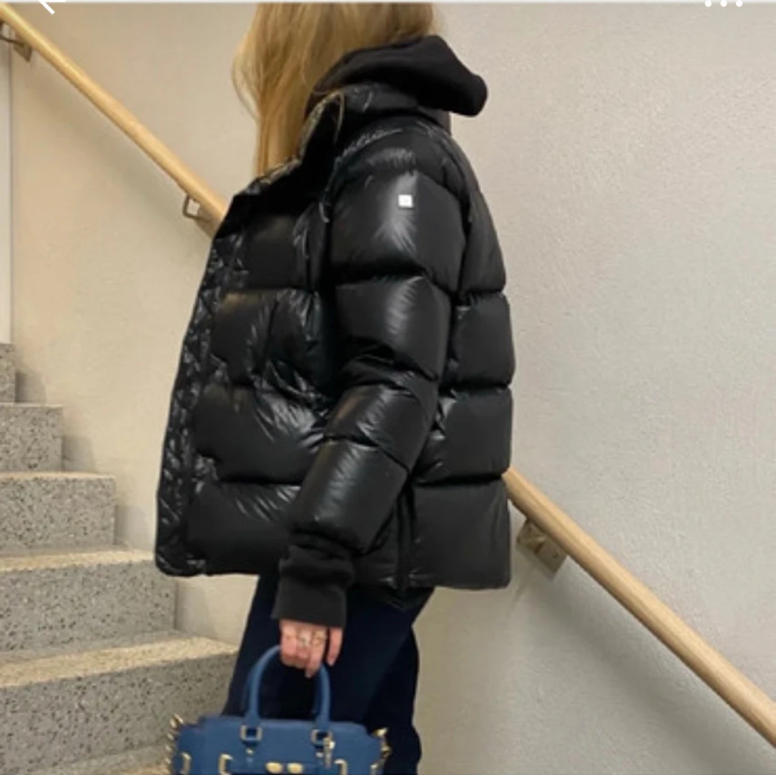 Svart pufferjacka Peak Performance