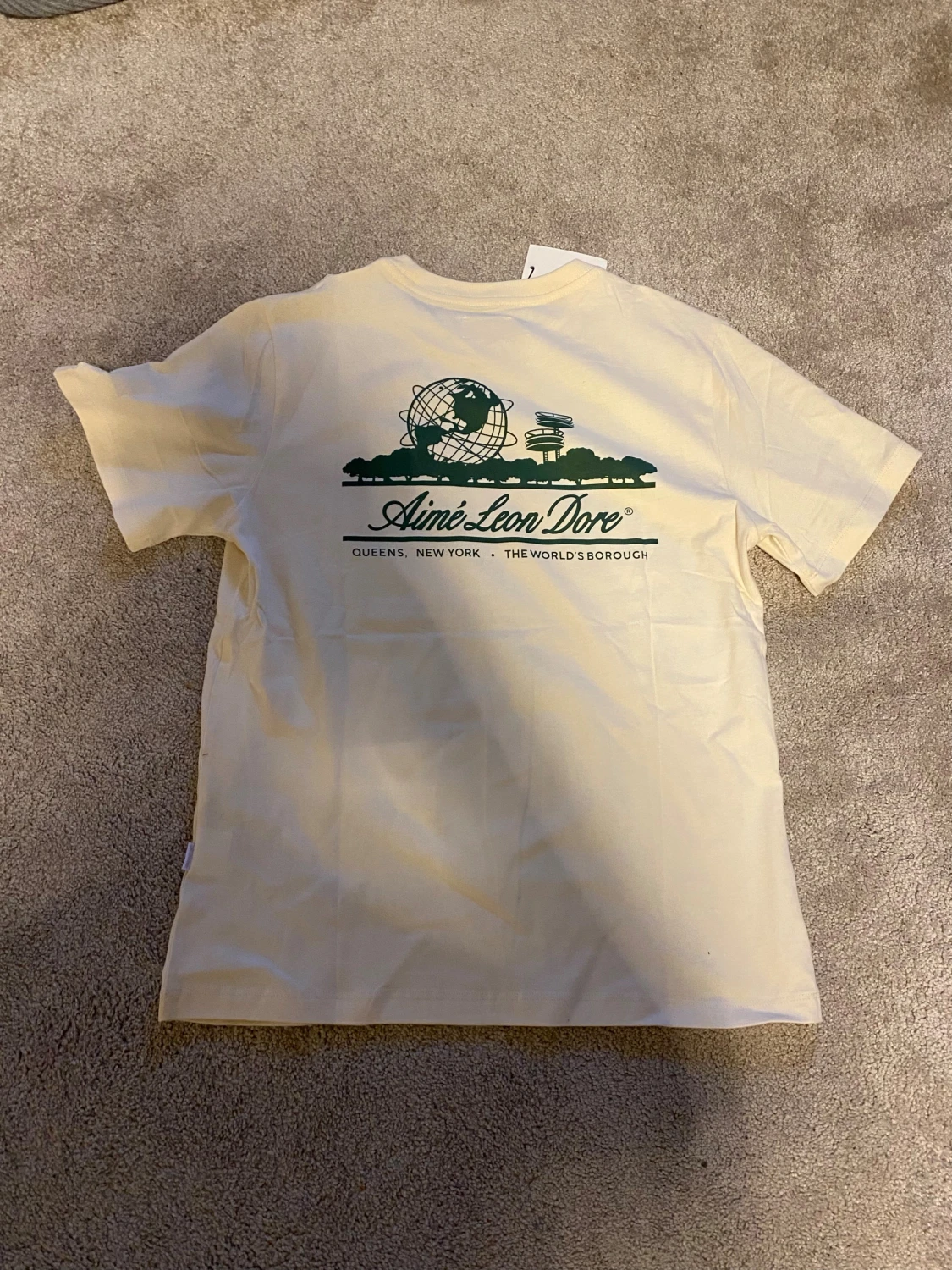 Aimé Leon Dore creme t-shirt med tryck - 1