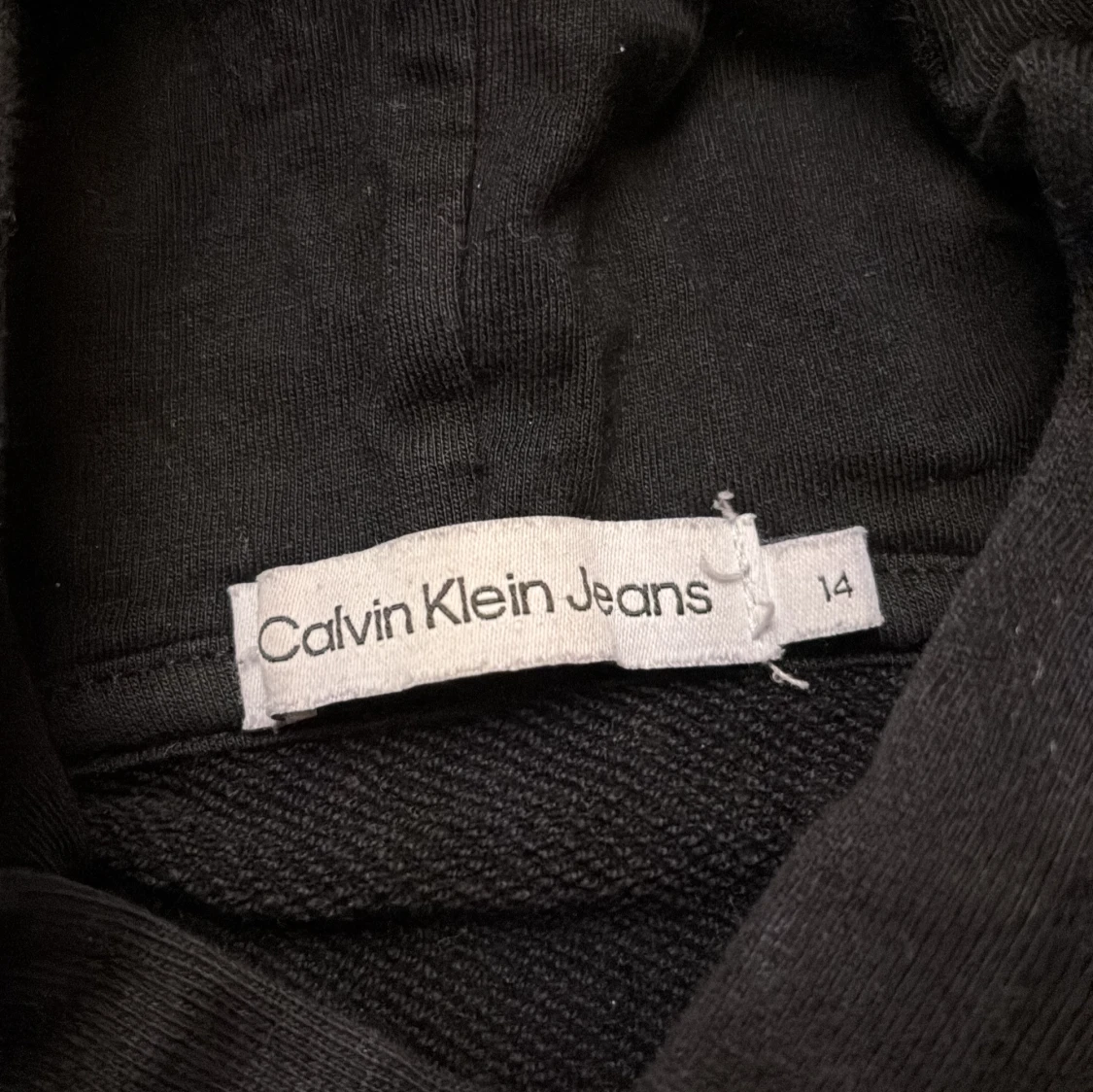 Svart hoodie från Calvin Klein Jeans - 1