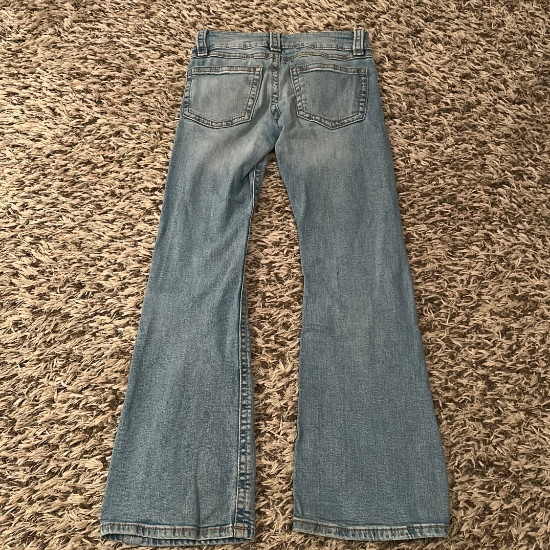 Ljusblå bootcut jeans  - 1