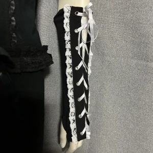 Långa handskar i onesize - Långa handskar i onesize. Material i stretchig bomullstrikå. Helt nya.