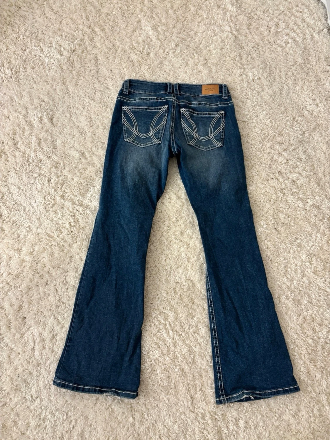 Blå bootcut jeans  - 1