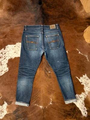 Selvage Nudie LeanDean - Tjena! Säljer dessa riktigt feta Selvage nudies, jeansen är i fint skick men det finns skavanker, W34/L32, hör av dig vid funderingar!🙌